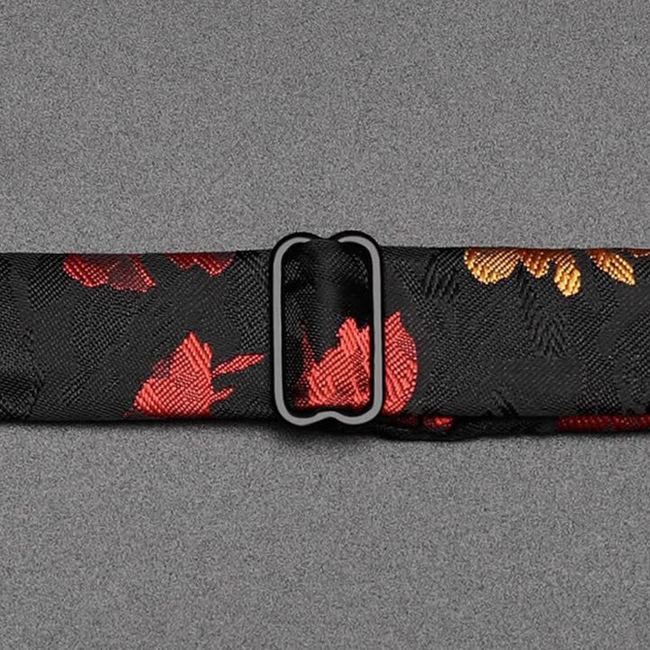 Pajarita con estampado floral en rojo y negro para hombre