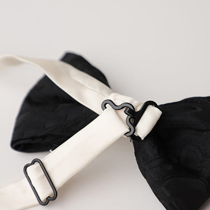 Pajarita elegante negra y blanca a juego para hombre
