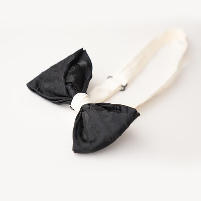 Pajarita elegante negra y blanca a juego para hombre