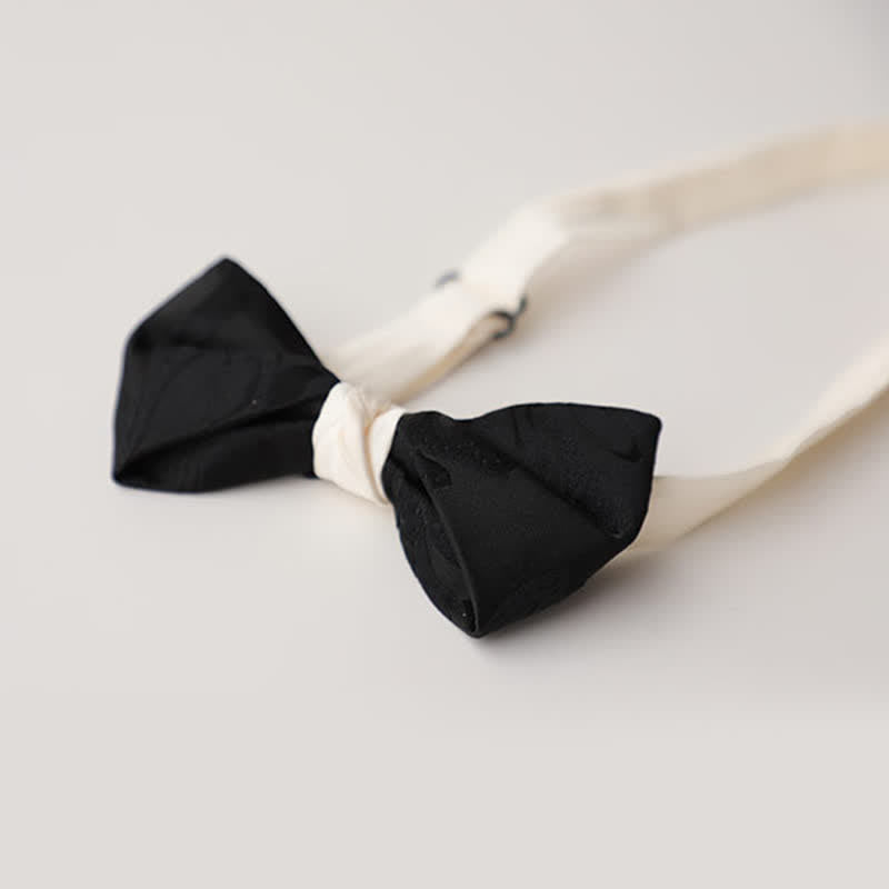 Pajarita elegante negra y blanca a juego para hombre
