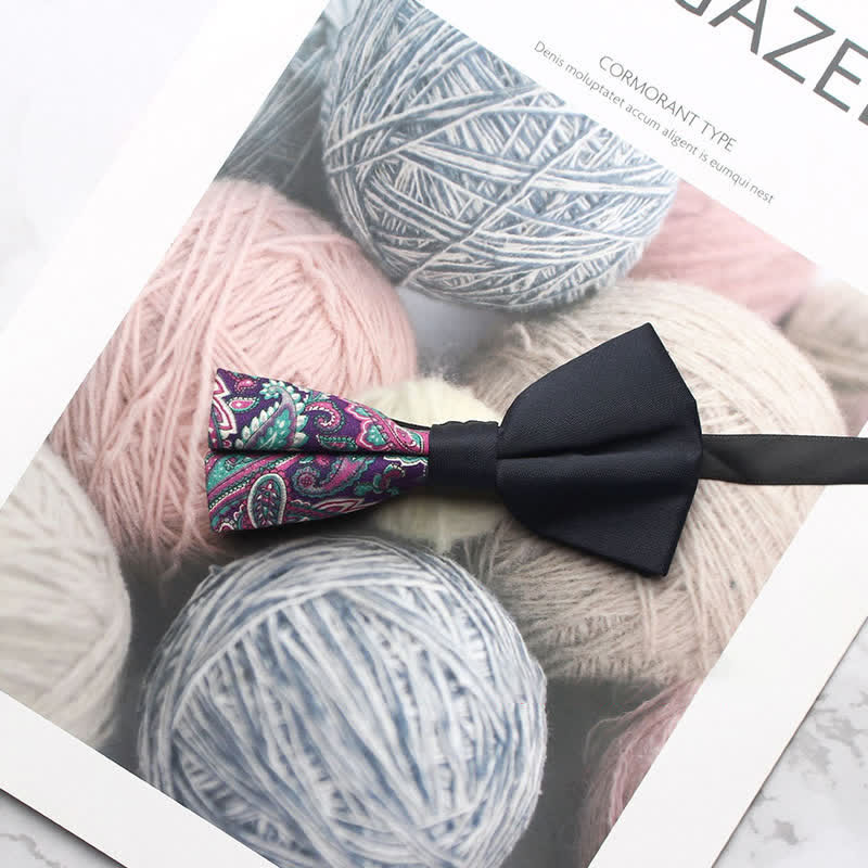 Pajarita negra con estampado paisley y empalmes para hombre