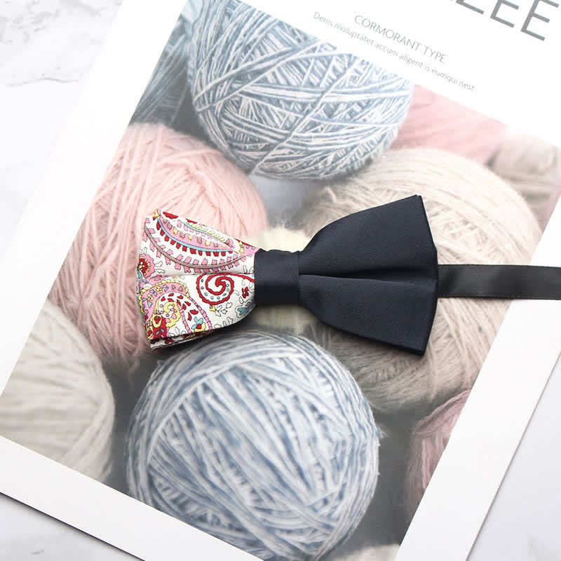 Pajarita negra con estampado paisley y empalmes para hombre