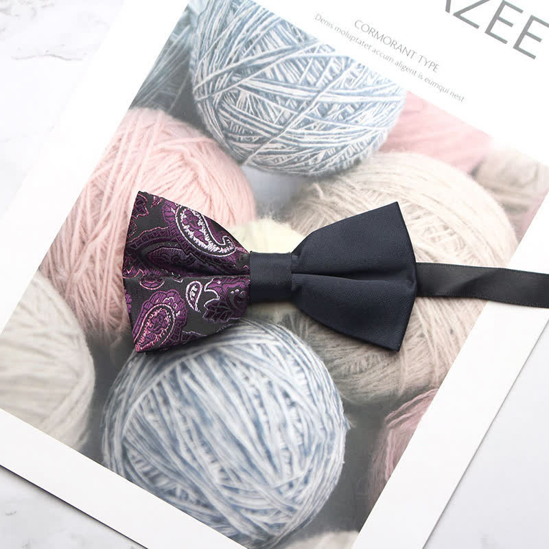 Pajarita negra con estampado paisley y empalmes para hombre