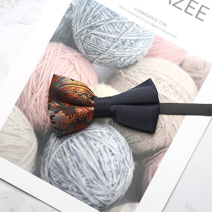 Pajarita negra con estampado paisley y empalmes para hombre
