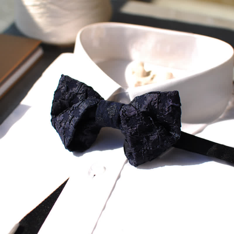 Pajarita elegante con estampado floral en jacquard negro para hombre