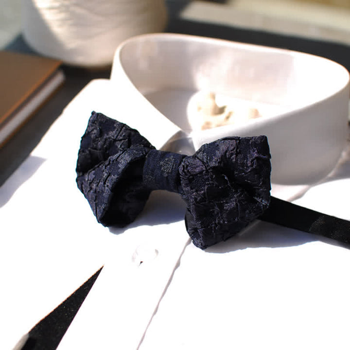 Pajarita elegante con estampado floral en jacquard negro para hombre