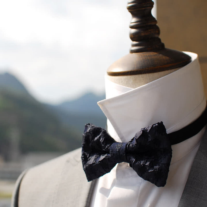 Pajarita elegante con estampado floral en jacquard negro para hombre