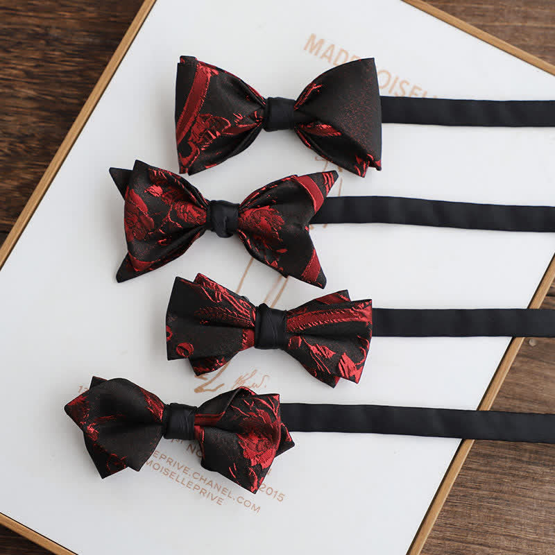 Pajarita negra con estampado floral rojo para hombre
