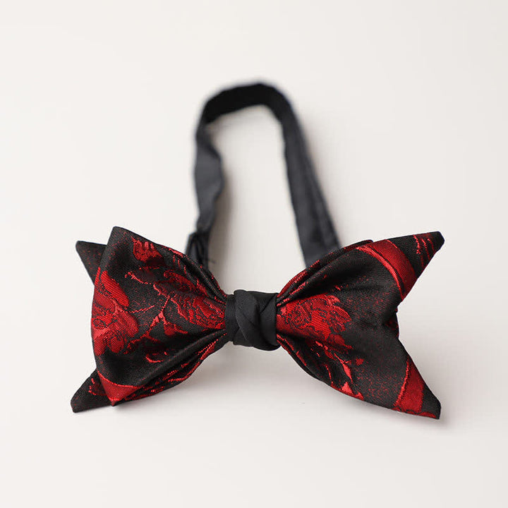 Pajarita negra con estampado floral rojo para hombre