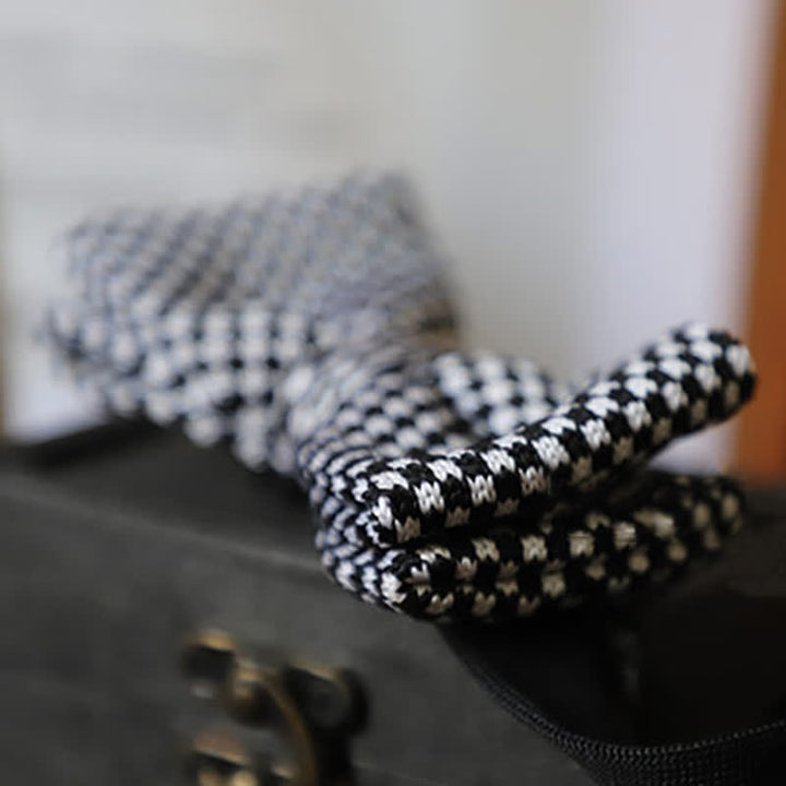 Pajarita de rayas de cuadros blancos y negros para hombre