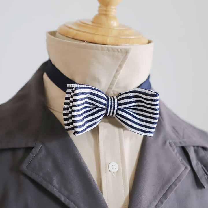 Pajarita de rayas de cuadros blancos y negros para hombre