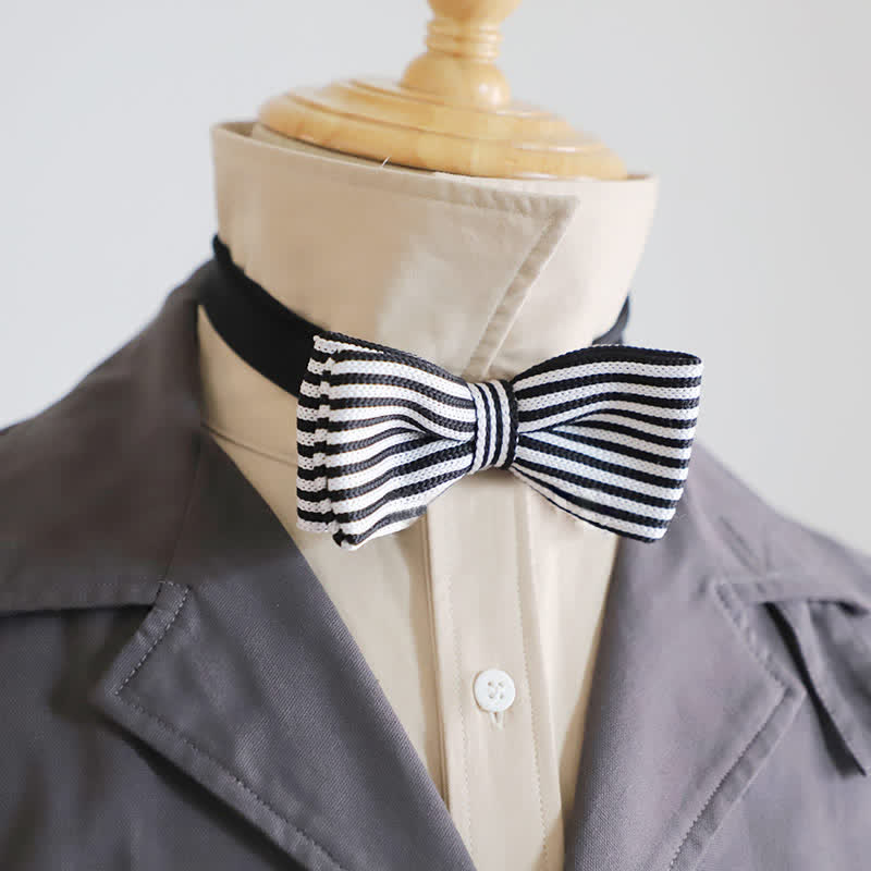 Pajarita de rayas de cuadros blancos y negros para hombre