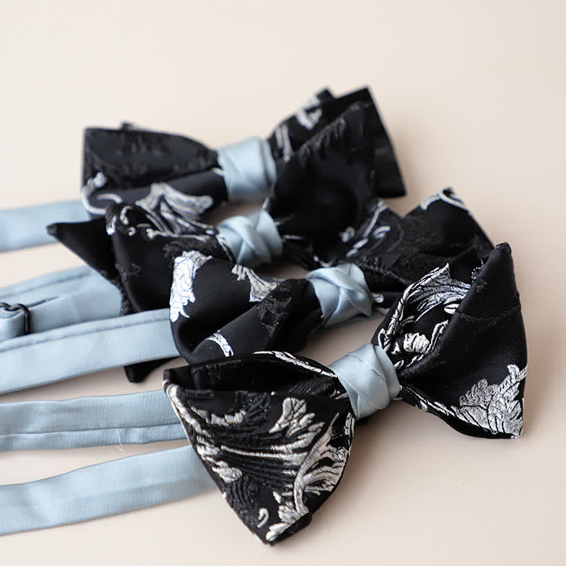 Pajarita con bordado floral en blanco y negro para hombre