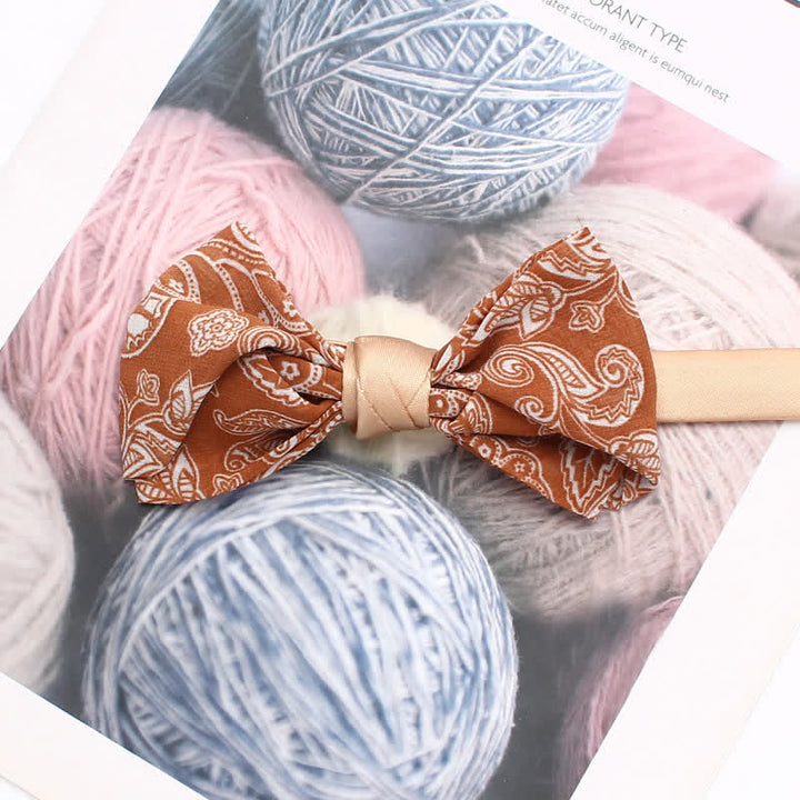 Pajarita con estampado floral de cachemira de color naranja para hombre