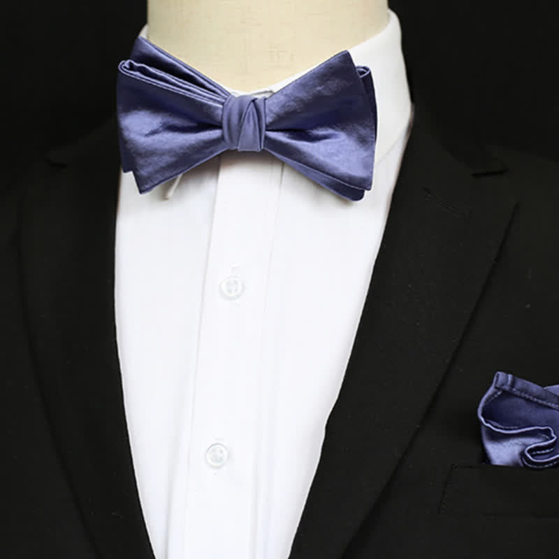 Pajarita elegante de color azul y morado liso para hombre