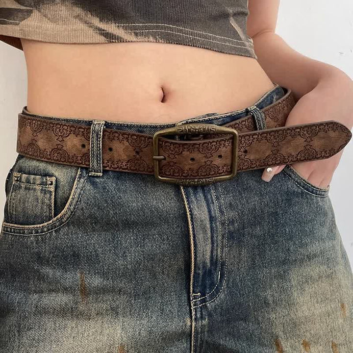 Cinturón de piel con estampado grabado en color marrón oscuro para mujer