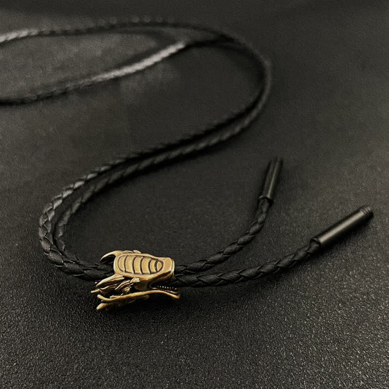Corbata de bolo con cabeza de dragón pequeño de bronce