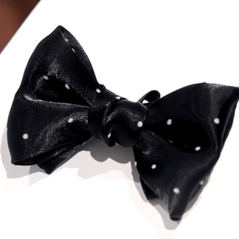 Pajarita romántica de lunares blancos y negros para hombre