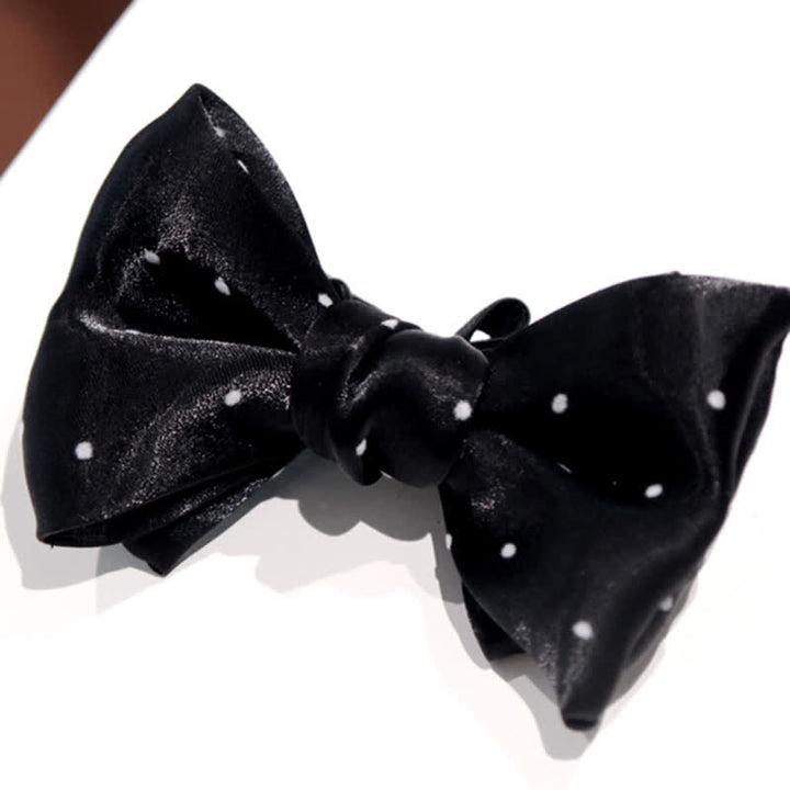 Pajarita romántica de lunares blancos y negros para hombre