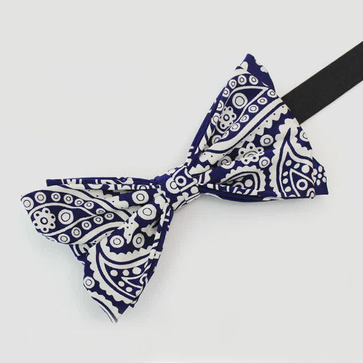 Pajarita para hombre con estampado de lunares en azul marino y blanco de anacardo