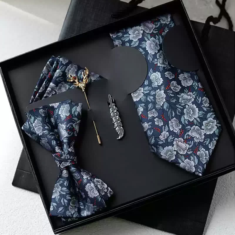 Caja de regalo con 5 pajaritas florales en azul marino y gris para hombre