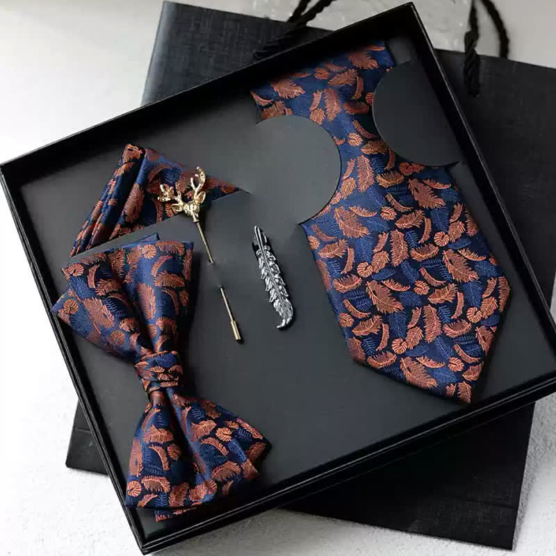 Caja de regalo con 5 pajaritas de color blanco y naranja con estampado de plumas para hombre