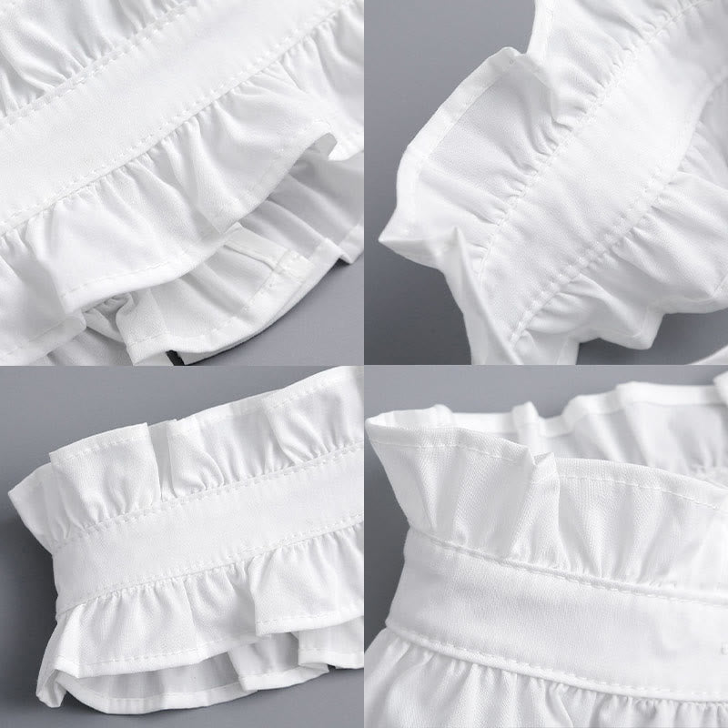 Camisa blanca con cuello plisado y botón desprendible