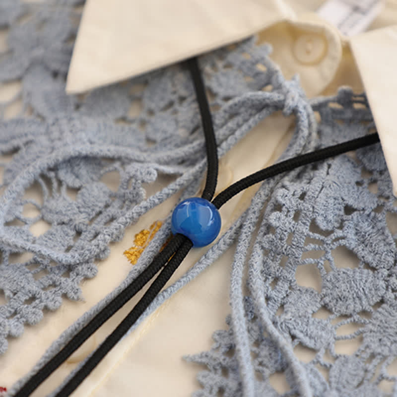 Colgante de ágata azul redondo sencillo hecho a mano con lazo bolo