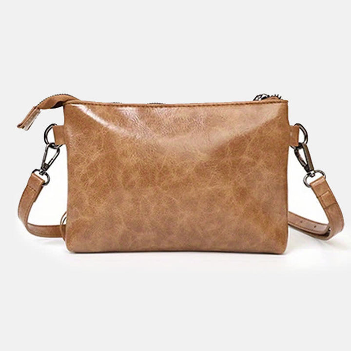 Bolso bandolera con flecos aztecas azules y estampado occidental para mujer