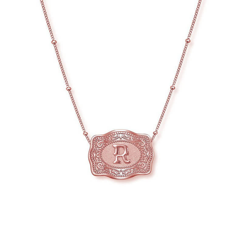 Collar con inicial en relieve en oro rosa