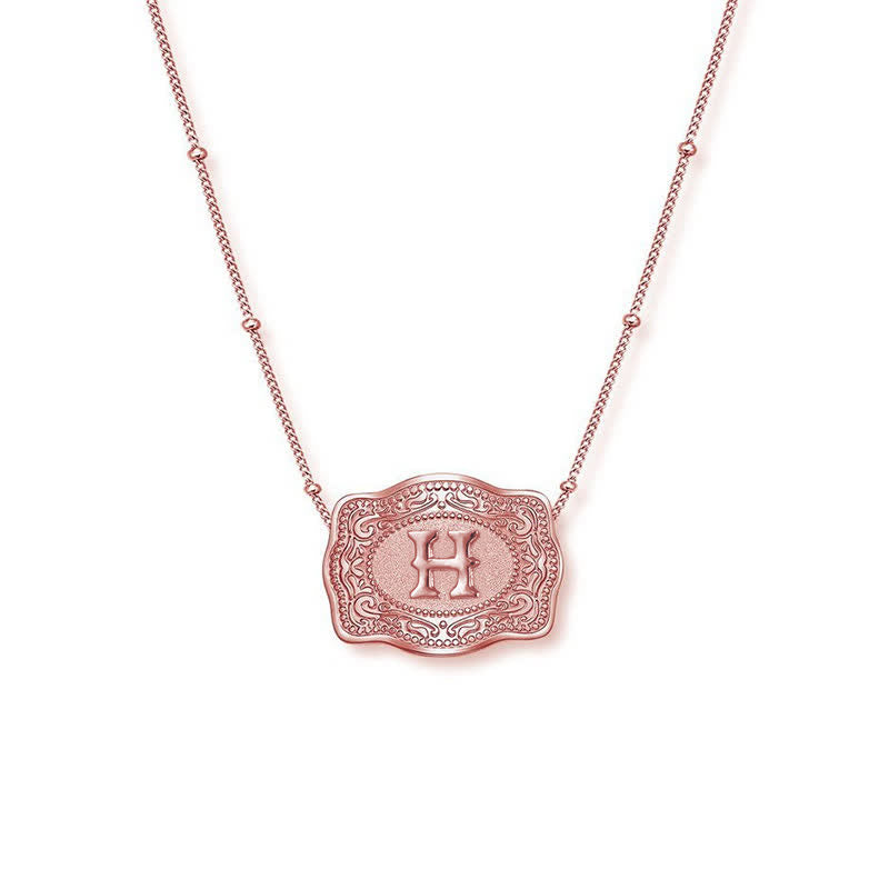 Collar con inicial en relieve en oro rosa