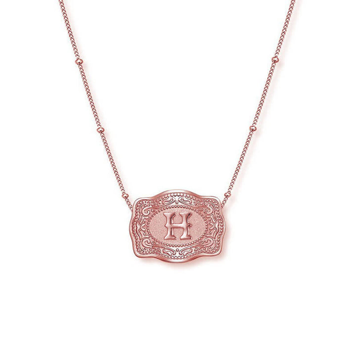 Collar con inicial en relieve en oro rosa