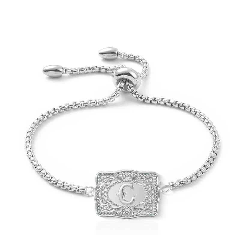 Pulsera de plata con letra inicial en relieve mini