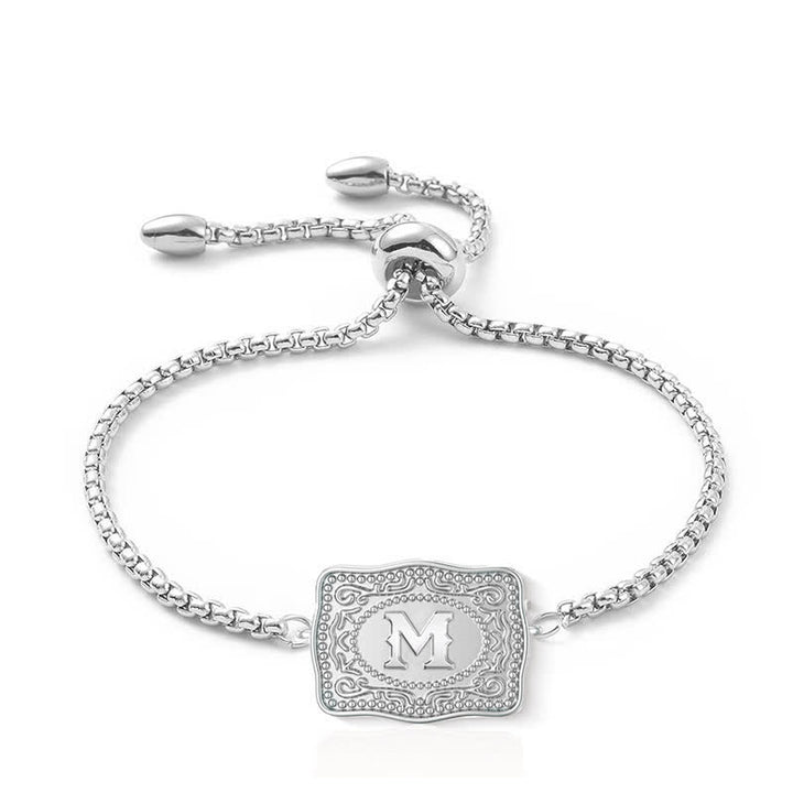 Pulsera de plata con letra inicial en relieve mini