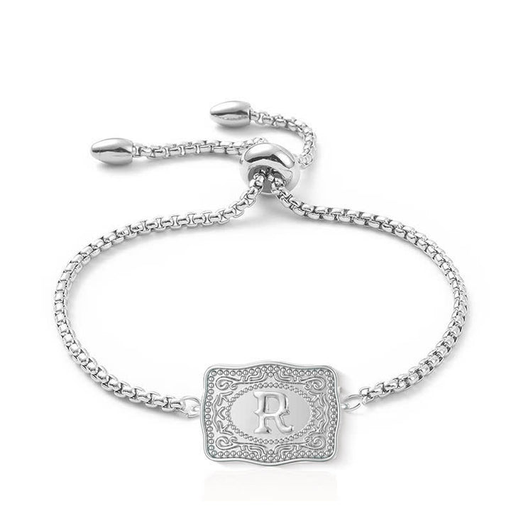 Pulsera de plata con letra inicial en relieve mini