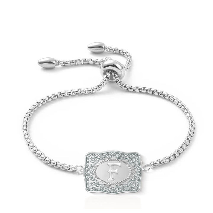 Pulsera de plata con letra inicial en relieve mini