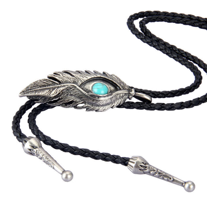 Corbata de bolo con forma de pluma e incrustaciones de piedra turquesa azul