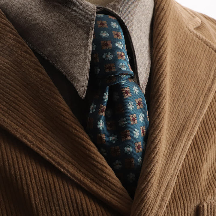 Corbata con textura y diseño de pequeñas flores geométricas para hombre