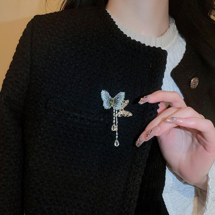 Broche elegante con borlas de mariposa azul para mujer