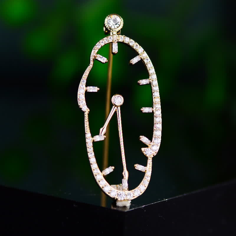 Broche unisex con reloj abstracto con hora invertida