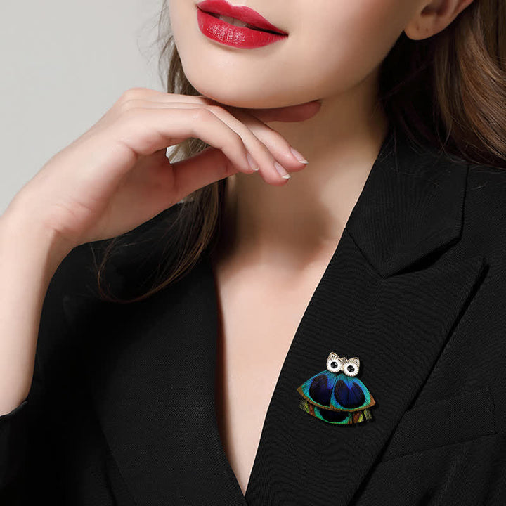 Precioso broche de plumas de pavo real y búho para mujer