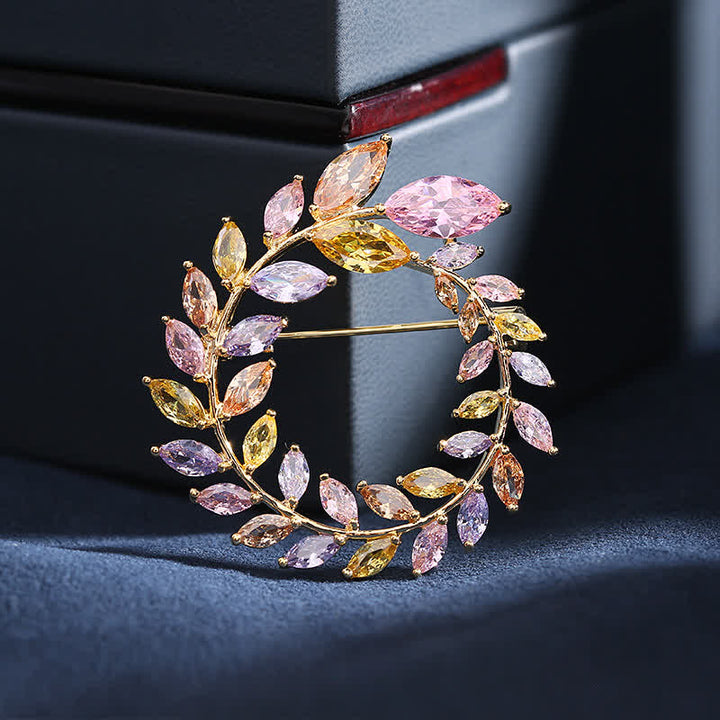Broche de hojas de trigo doradas y circonitas para mujer