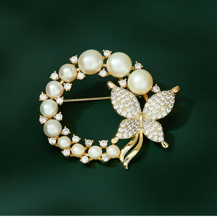 Broche de mariposa dorada con corona de perlas para mujer