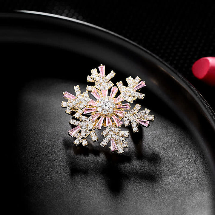Broche de copo de nieve giratorio para mujer