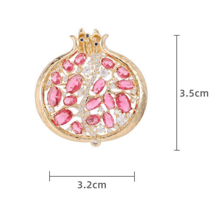 Broche elegante de mujer con forma de insecto y granada.