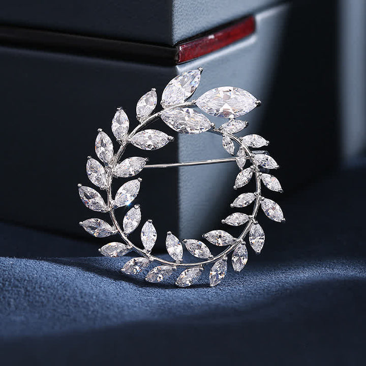 Broche de hojas de trigo doradas y circonitas para mujer
