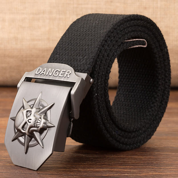 Cinturón de lona tejida con hebilla automática de calavera para hombre