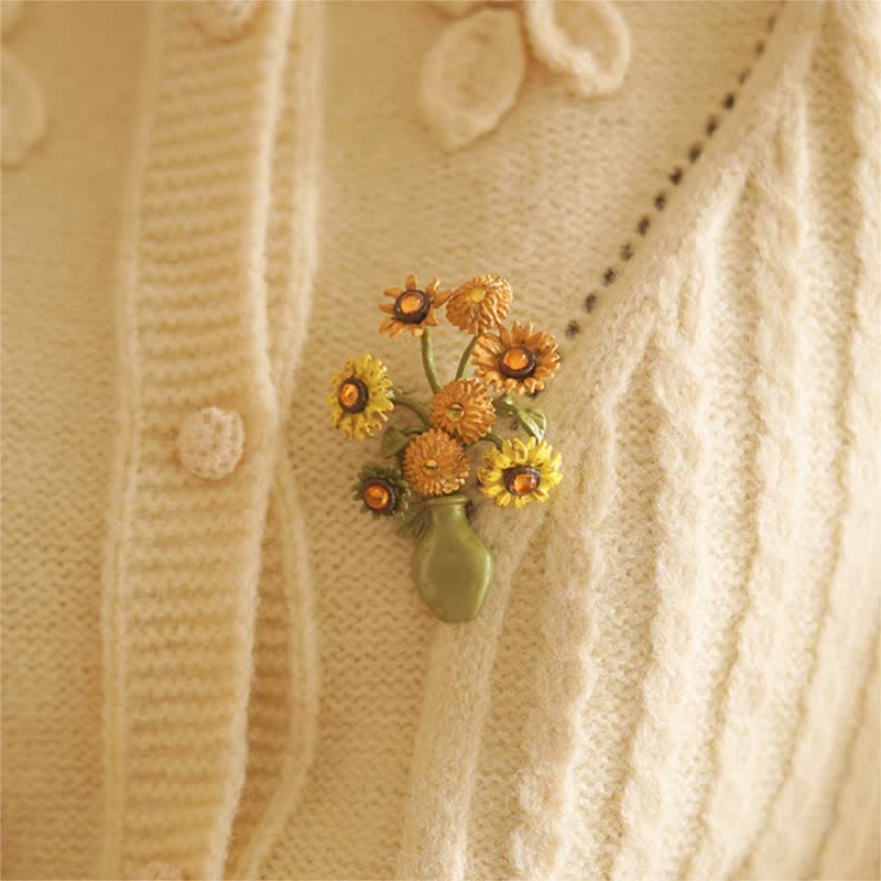 Broche de mujer con forma de girasol esmaltado