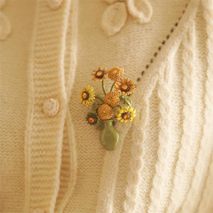 Broche de mujer con forma de girasol esmaltado