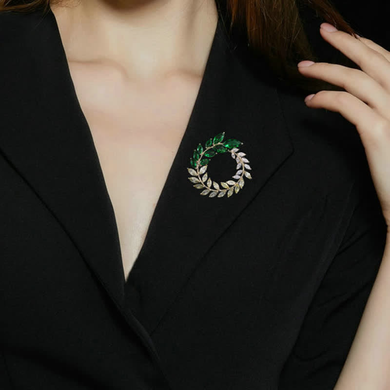 Broche de hojas de trigo doradas y circonitas para mujer
